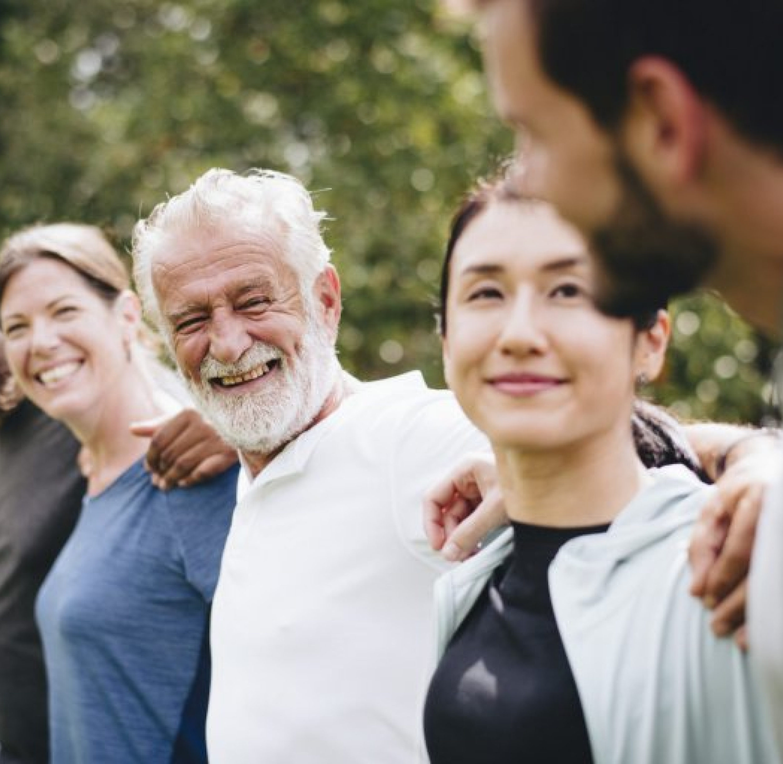 people_standing_with_hands_on_shoulder